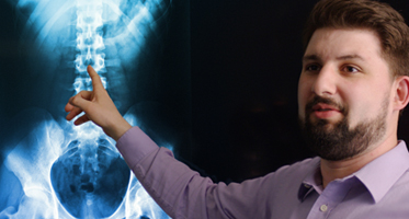 Dr. Ben Wyant pointing to an xray