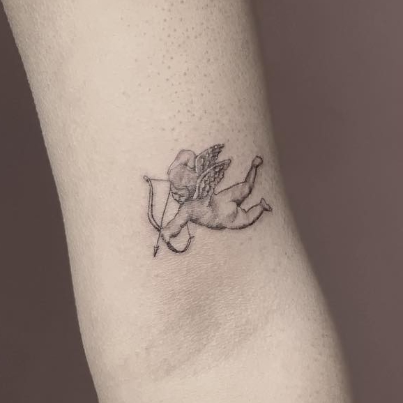 Cowboy hat and the desert tattoo fine line