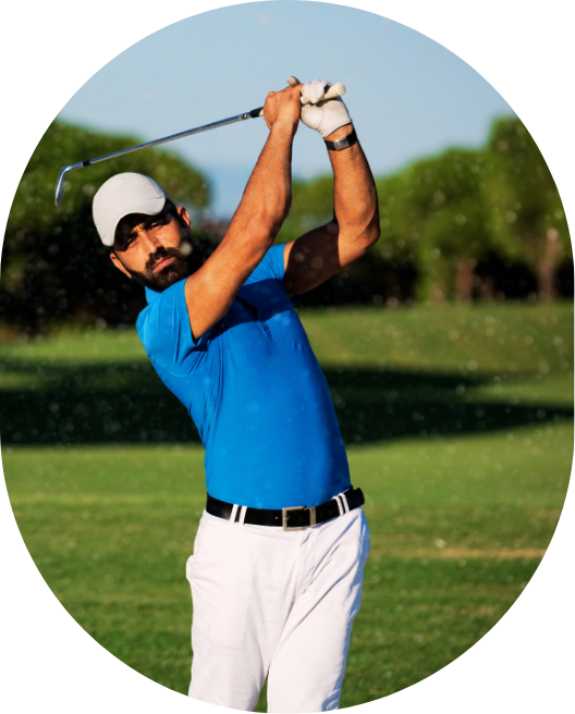 Man swinging a golf club on the green, illustrating mental clarity and golf performance psychology for staying composed under pressure.