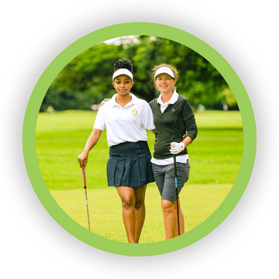 Coach and young woman standing together, emphasizing golf mindset coaching and teaching mental resilience alongside technical precision.