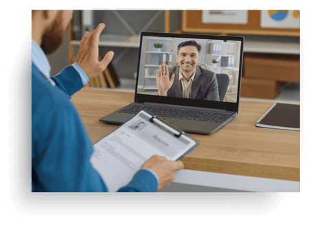 Male Emotional Footprint coach welcoming a client on a video call, showcasing trauma-informed coaching and one-on-one emotional coaching using the Biko Method for rapid emotional relief.