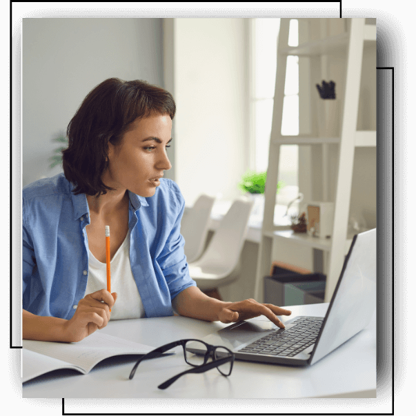 Woman participating in a 24-session Biko Method program, taking notes during a virtual emotional healing session. Designed for individuals seeking profound emotional change, this intensive emotional coaching clears subconscious patterns and supports deep emotional transformation.