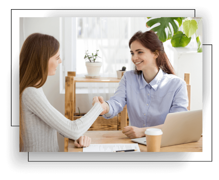 Certified Emotional Footprint Coach warmly greeting a client, symbolizing trust and connection in trauma-informed intensive coaching. The Biko Method provides comprehensive emotional wellness for professionals addressing deep-seated trauma.