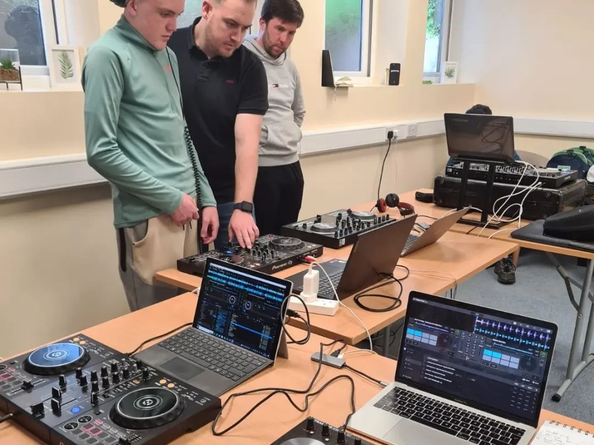 The first Studio 109 DJ cohort learning with Paul McGuinness