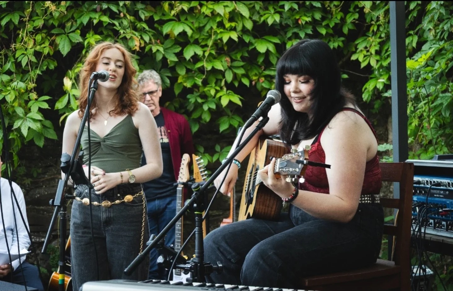 Songwriting 101 graduates performing live on stage
