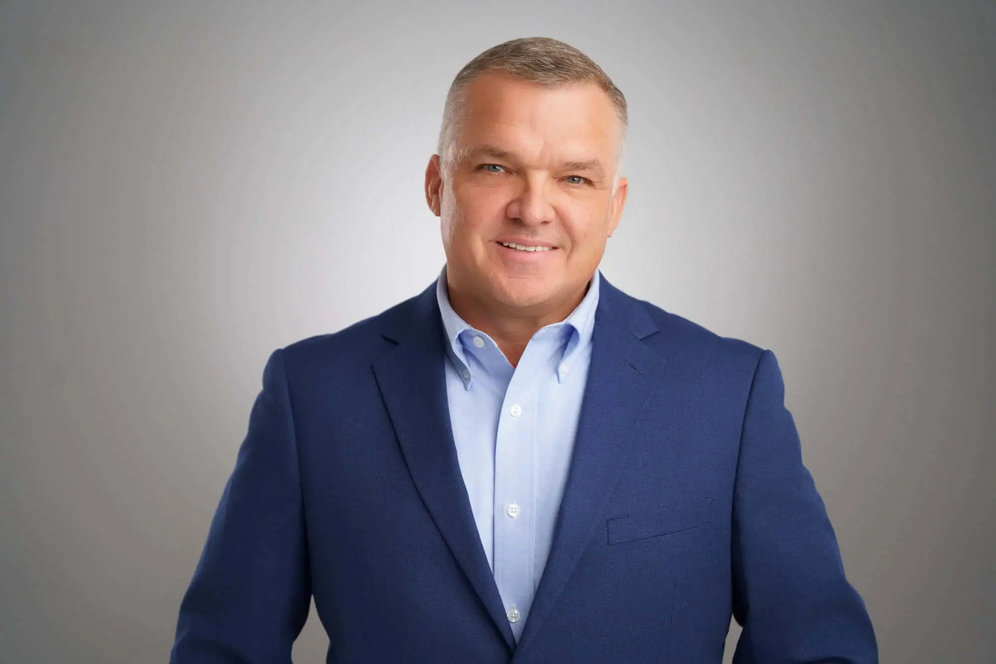 headshot of male in professional attire