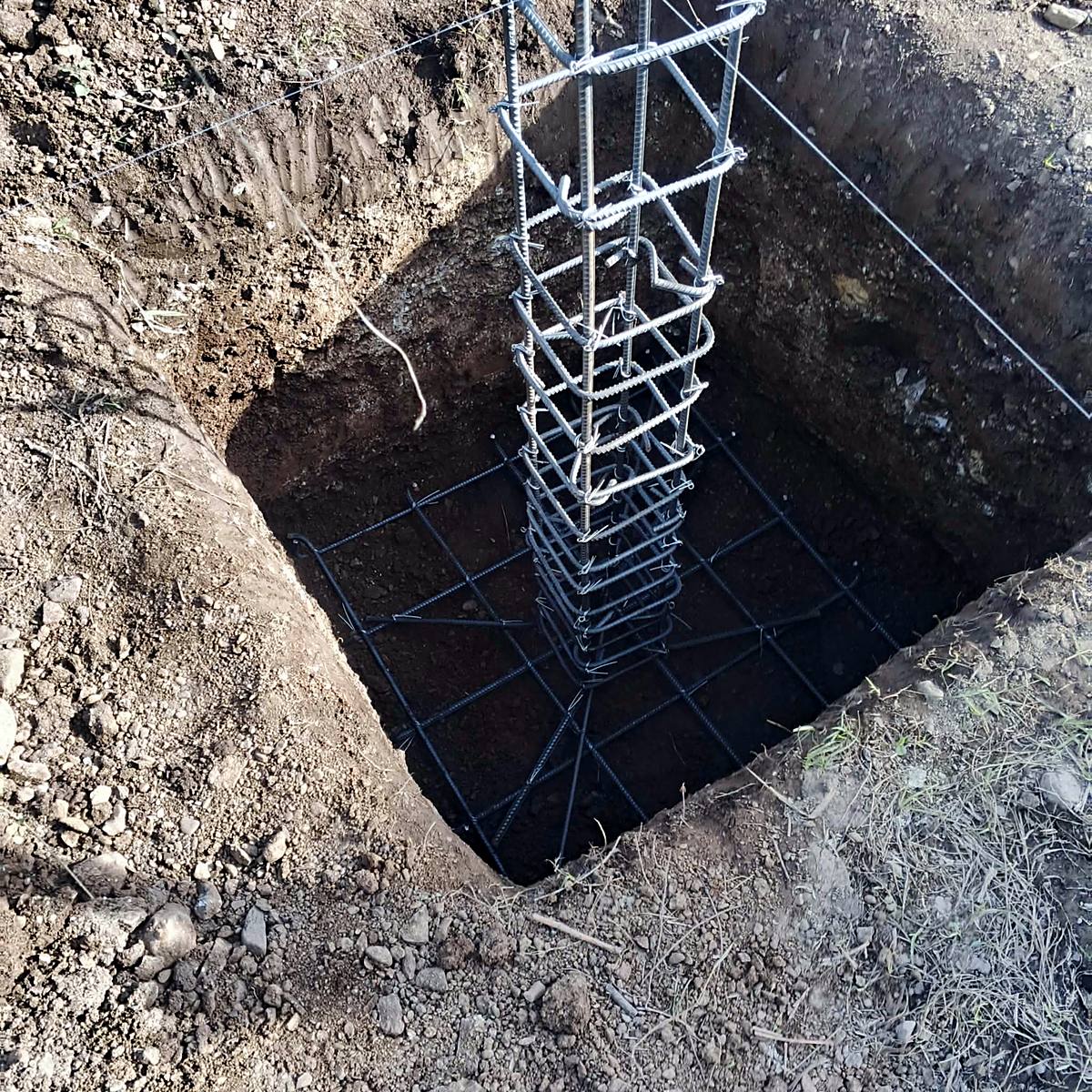 Reinforced column footing before the concrete pour — Triple J Builders