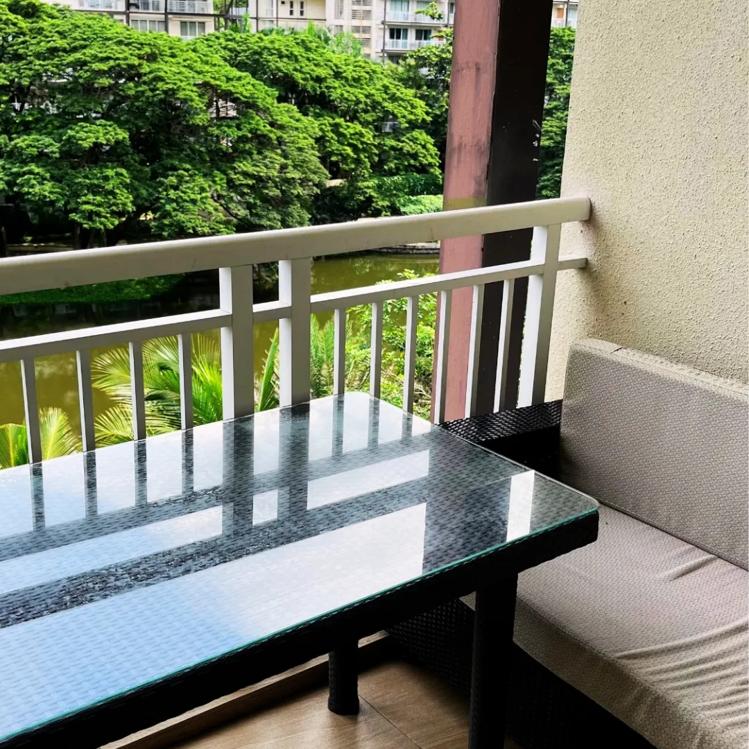 Balcony with seating among the trees