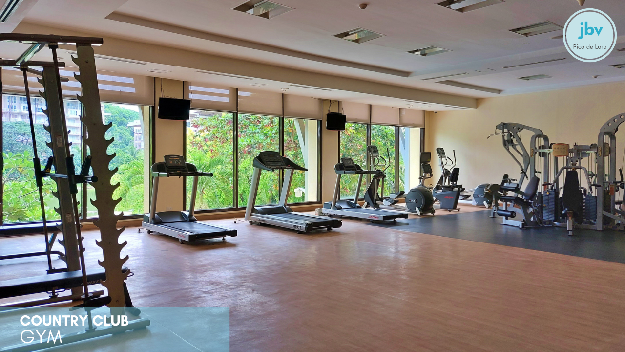 Country club gym with treadmills and weights