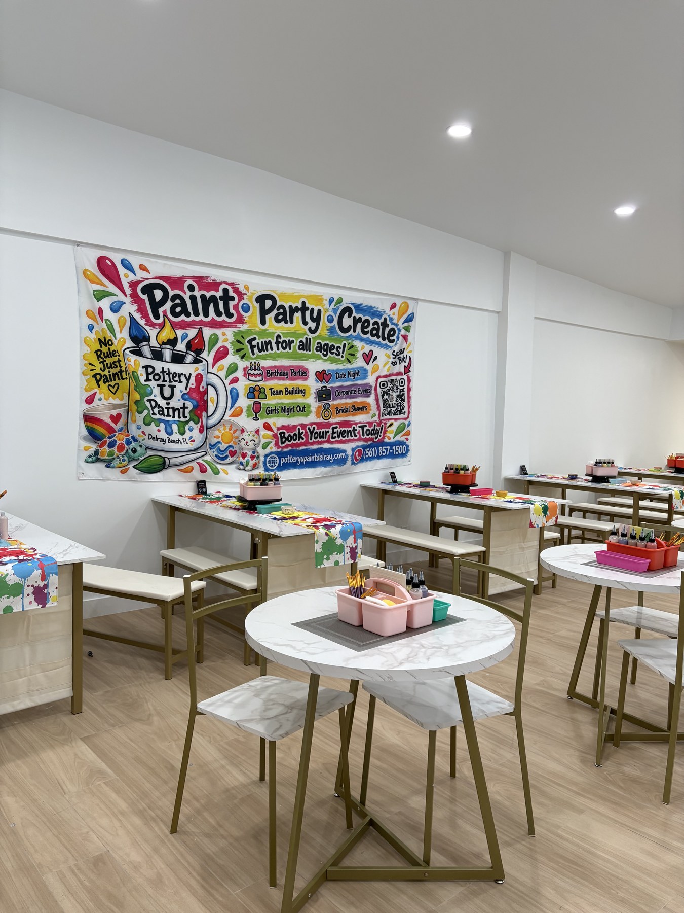 Colorful Pottery U Paint Delray studio with painting tables and Paint Party Create wall art