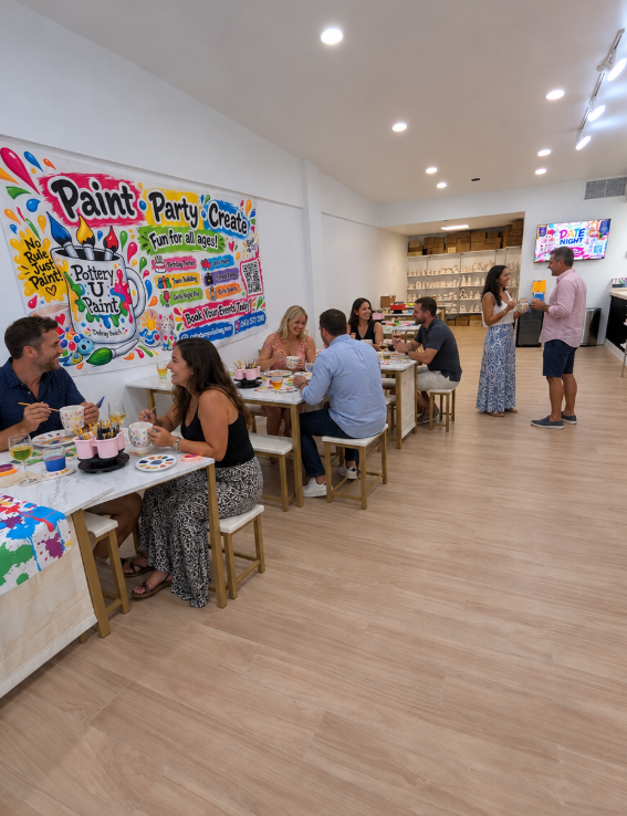 Singles painting pottery and socializing at Pottery U Paint Delray