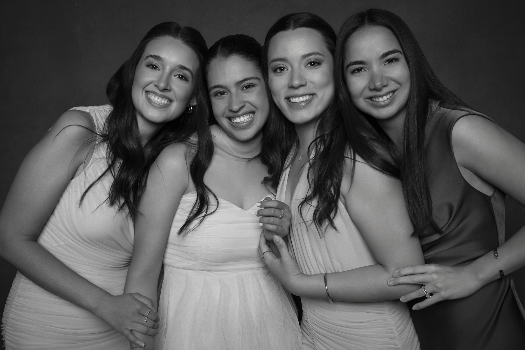 Elegant black and white portrait of friends photographed during a luxury wedding reception, celebrating lifelong friendships and meaningful wedding memories.