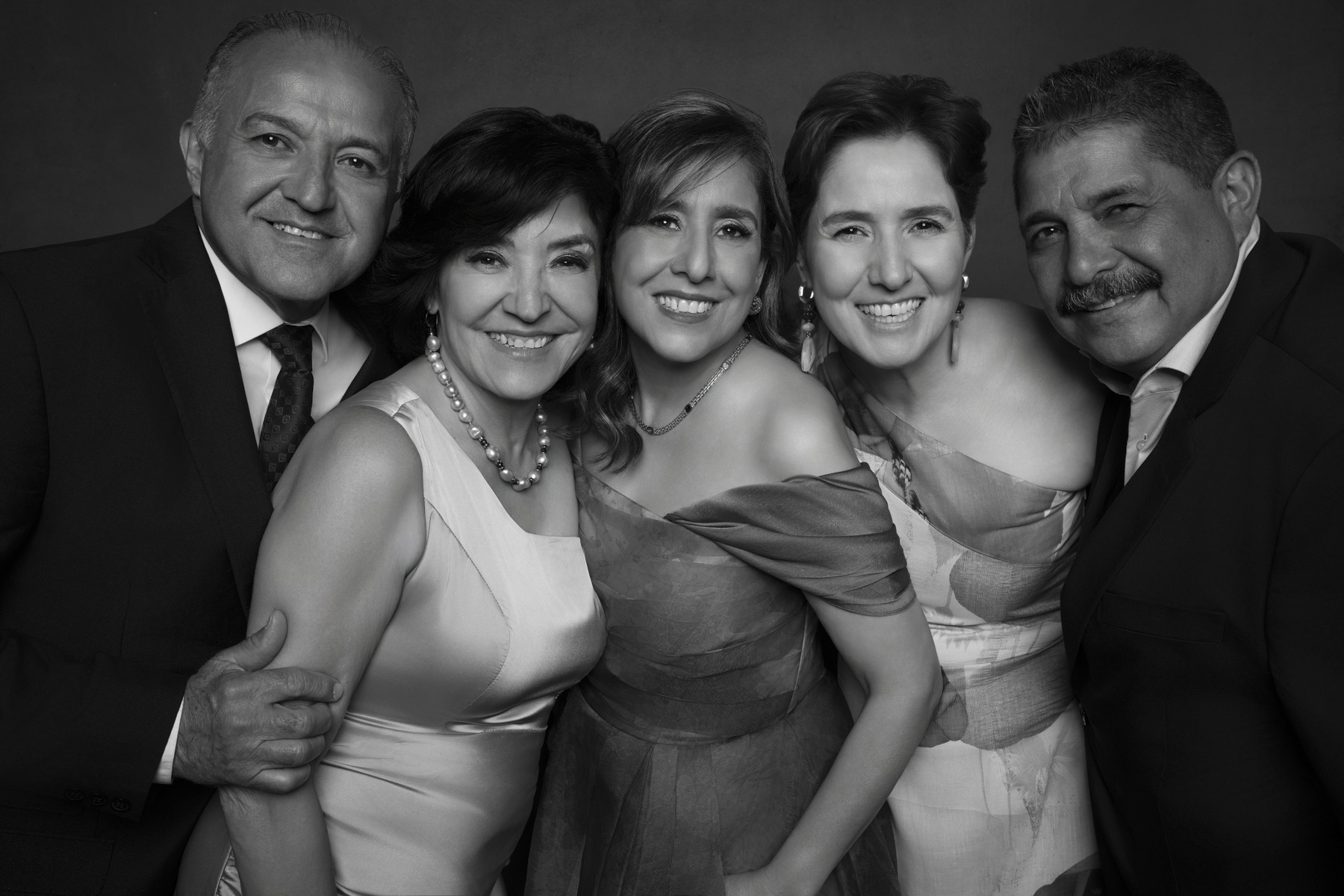 Wedding guests gathered for a black and white portrait during a Vancouver wedding reception Wedding guests gathered for a black and white portrait during a Vancouver wedding reception