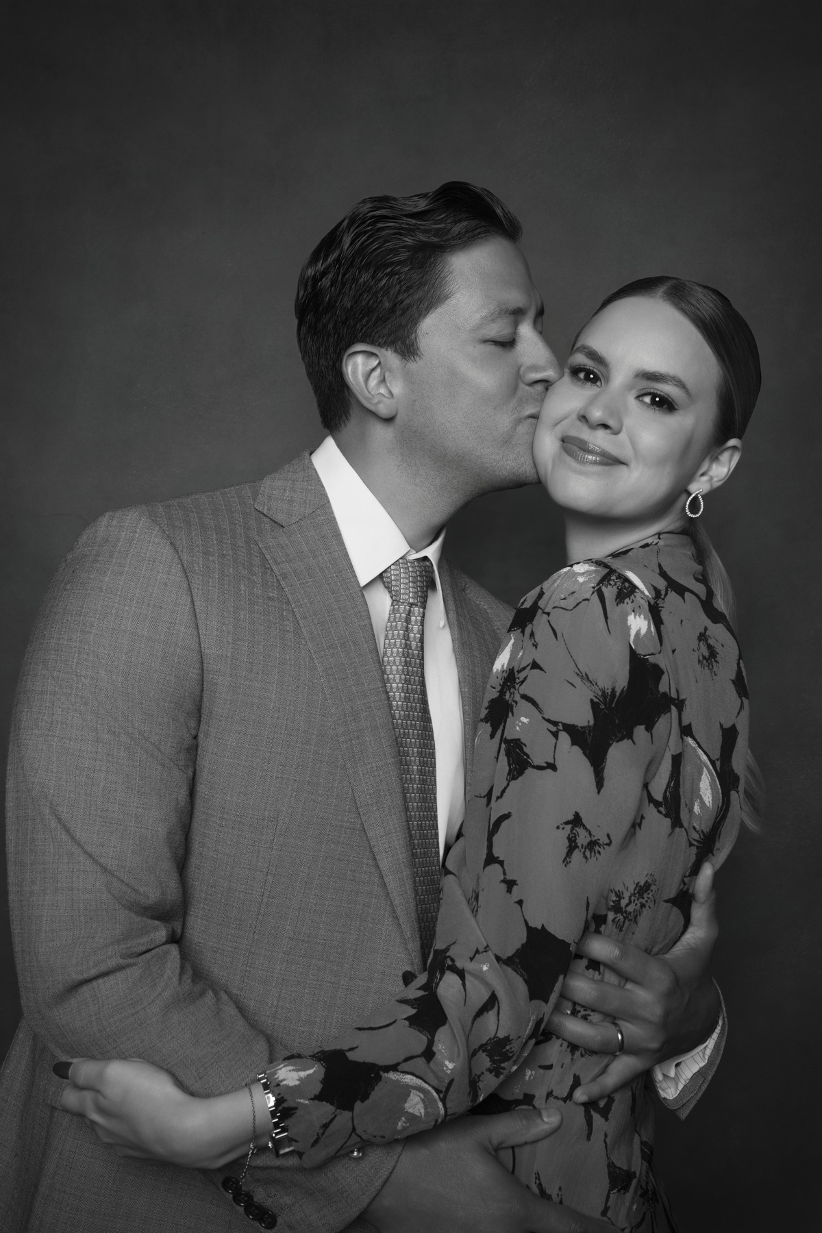 Timeless black and white portrait of a couple during a luxury wedding reception, capturing an elegant and meaningful guest experience.