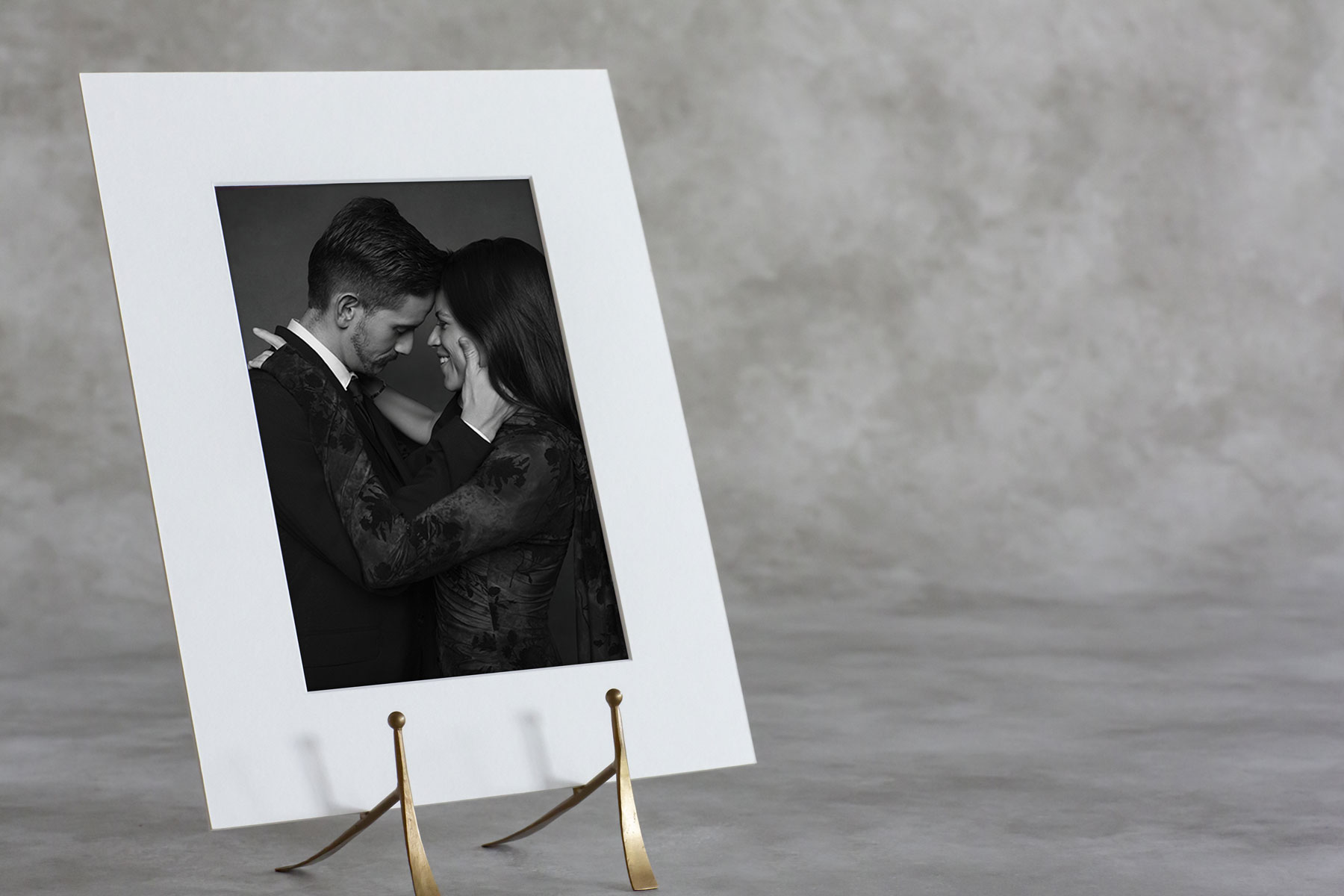 Matted black and white wedding portrait presented as a keepsake for wedding guests Matted black and white wedding portrait presented as a keepsake for wedding guests
