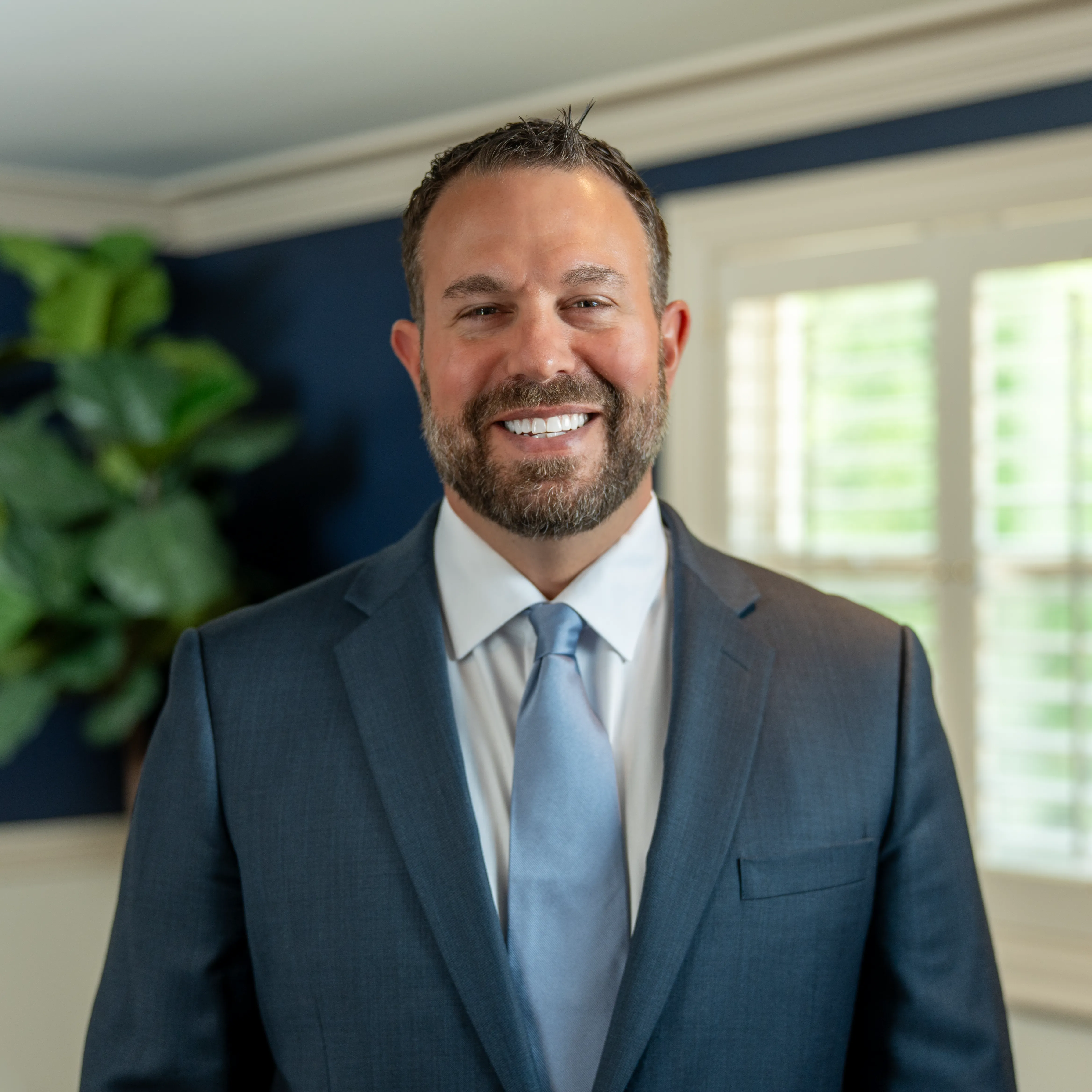 Anthony Olivieri III, CIC, Buell & Olivieri Co-Owner, professional headshot.