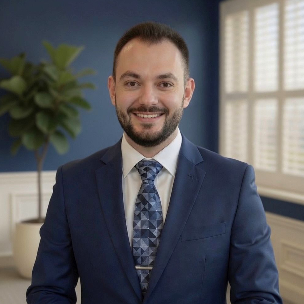 Anthony Olivieri III, Co-Owner at Buell & Olivieri Insurance, professional headshot in business attire.