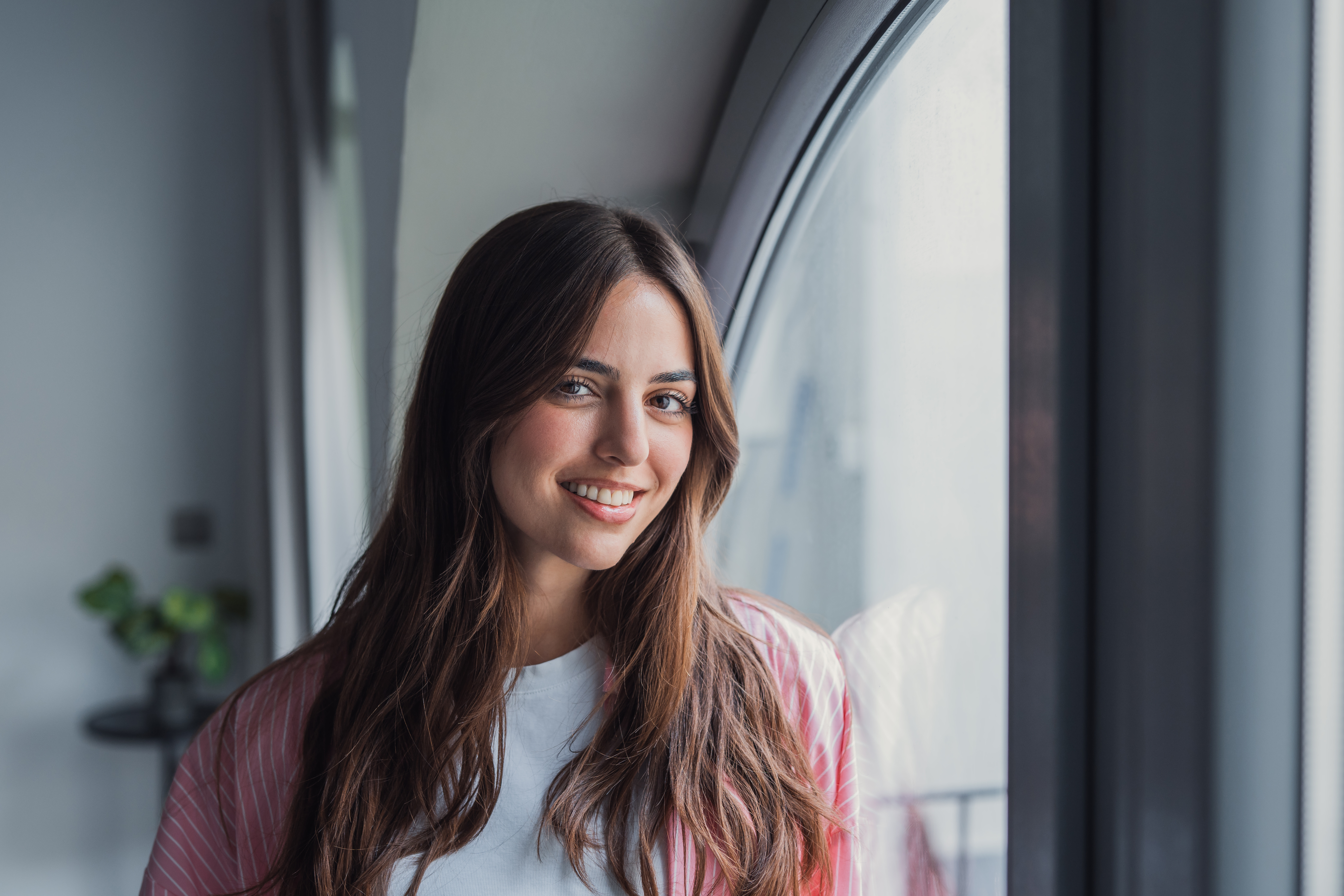 Healthy adult portrait in warm window light
