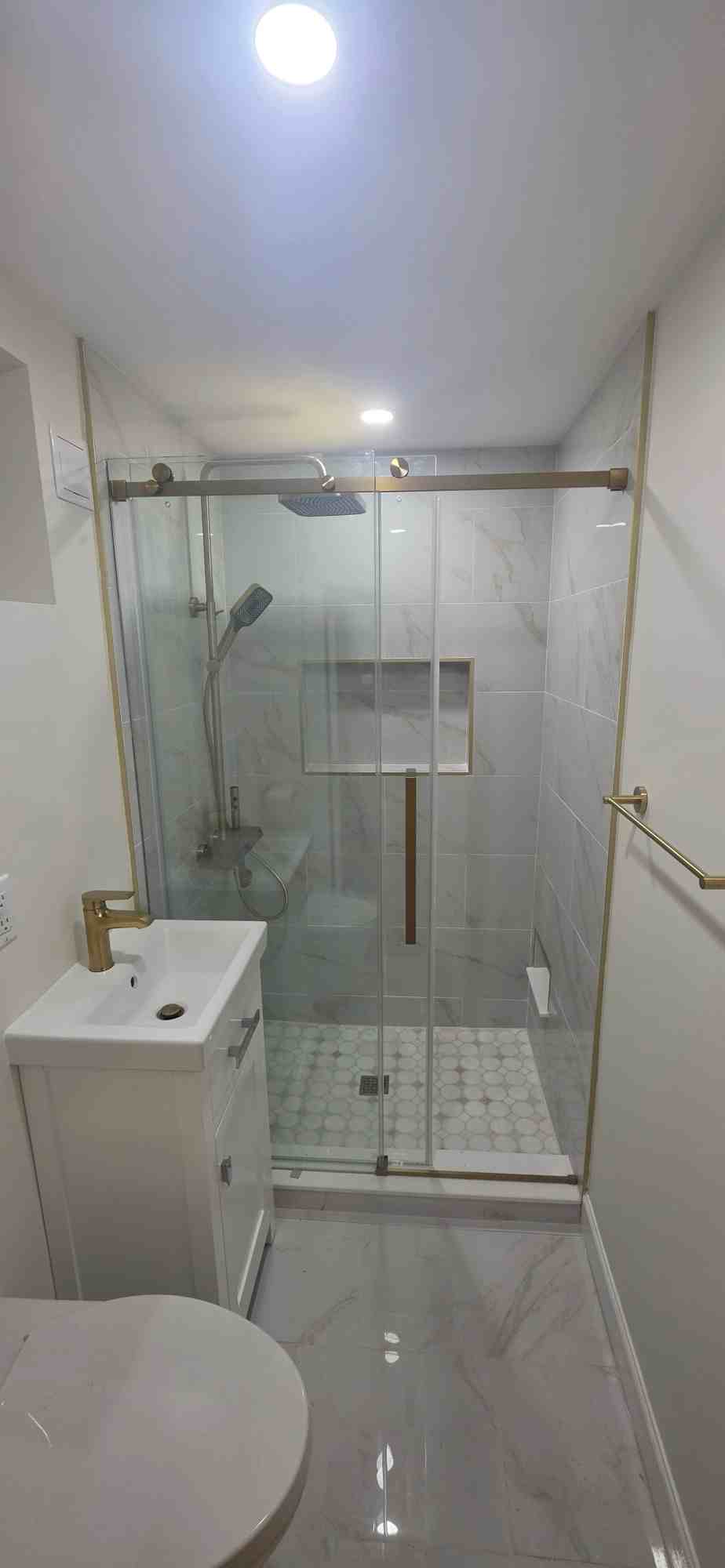 Bathroom remodel with glass walk-in shower by Home Improvements by Joseph, after