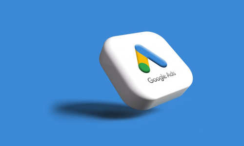 3D Google Ads logo block floating against a blue background, representing digital advertising and pay-per-click marketing.