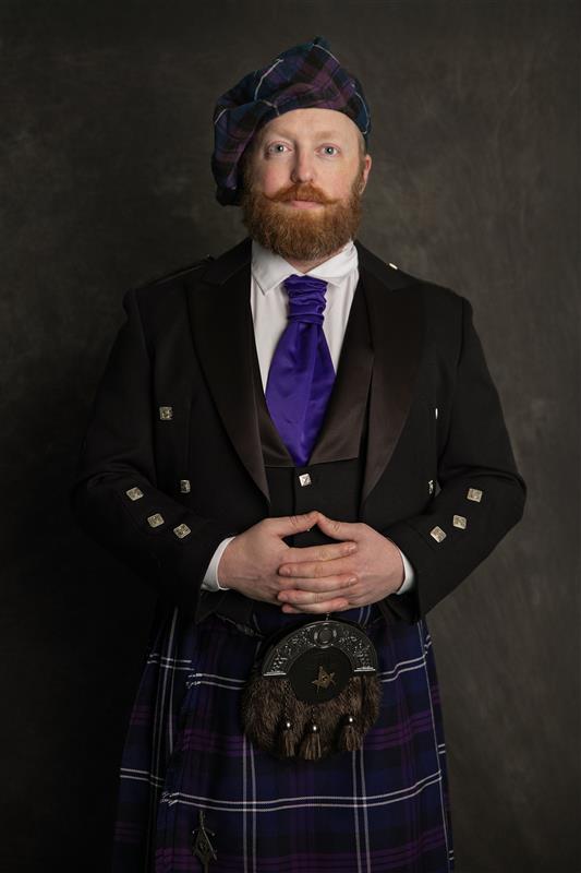 Dr. Zachariah Seiden in formal attire