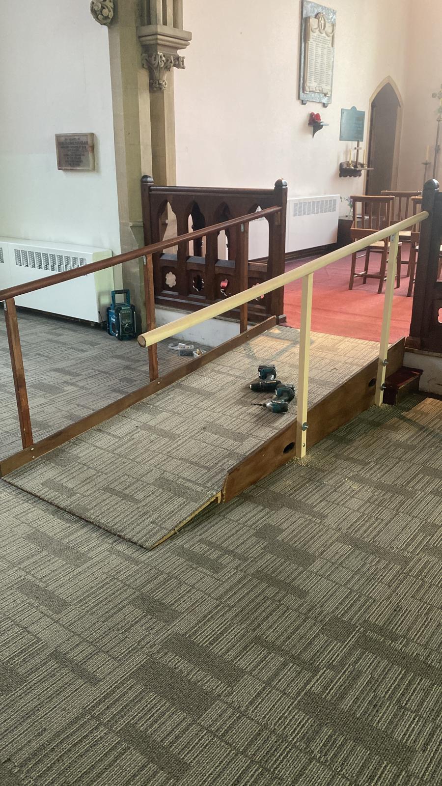 New handrail fitted to church access ramp — matching joinery carpentry work by Surrey handyman Jonathan Mills based in Epsom
