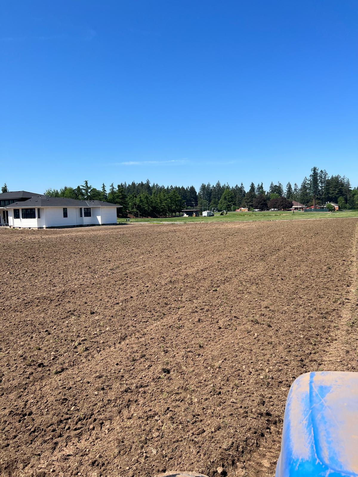 Graded acreage ready for seeding completed by Metro Mowing Services and Maintenance LLC