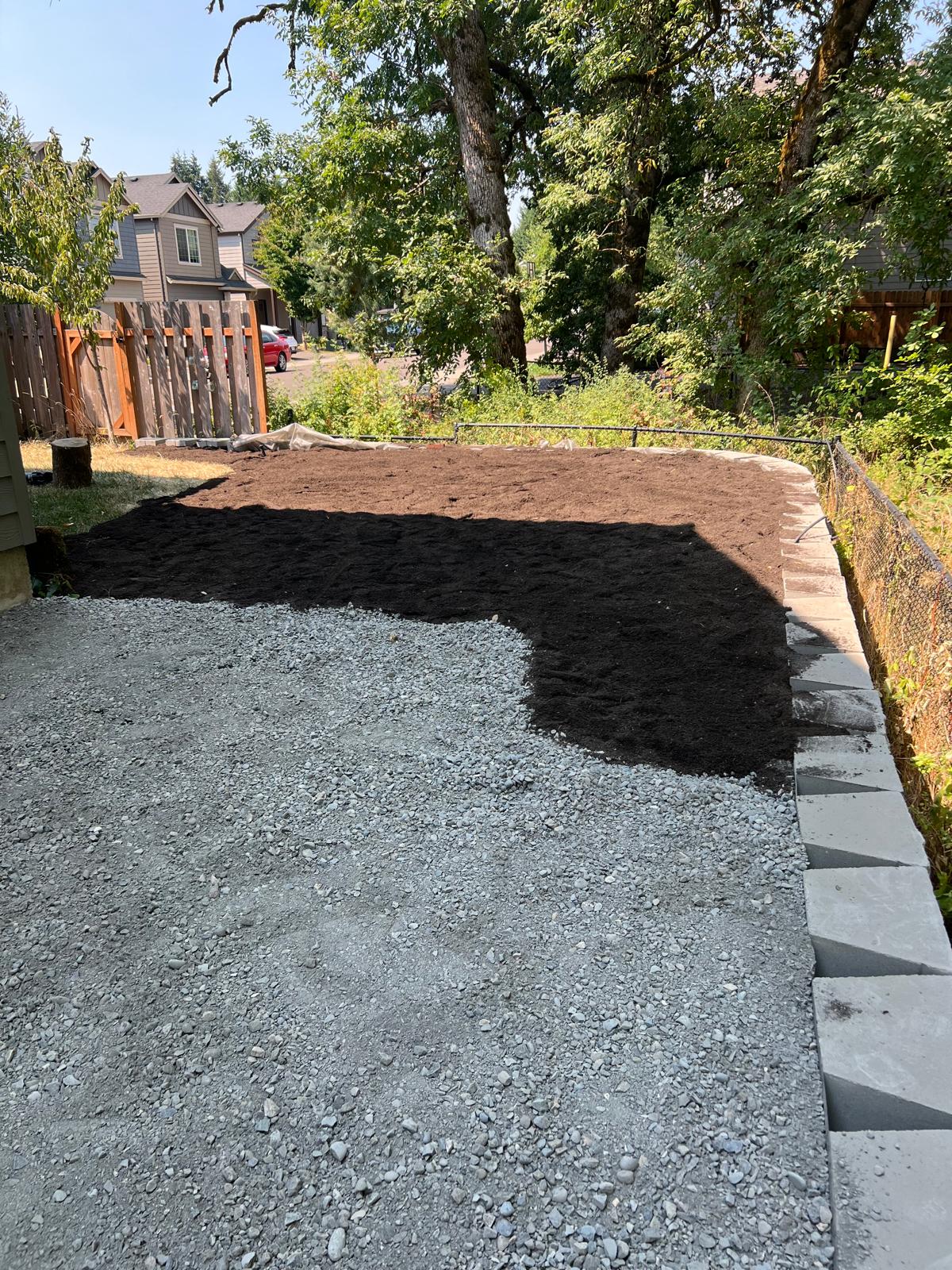Gravel and topsoil bed install completed by Metro Mowing Services and Maintenance LLC