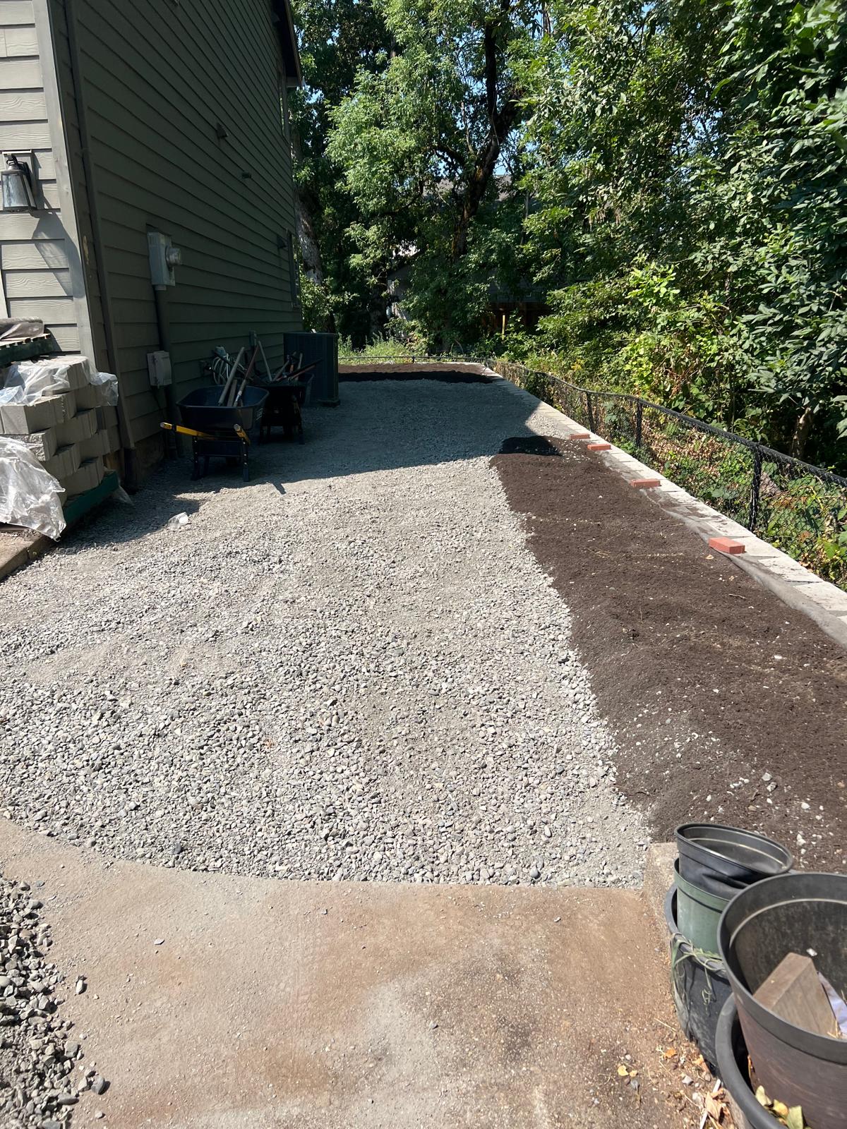 Gravel pad and bed prep completed by Metro Mowing Services and Maintenance LLC