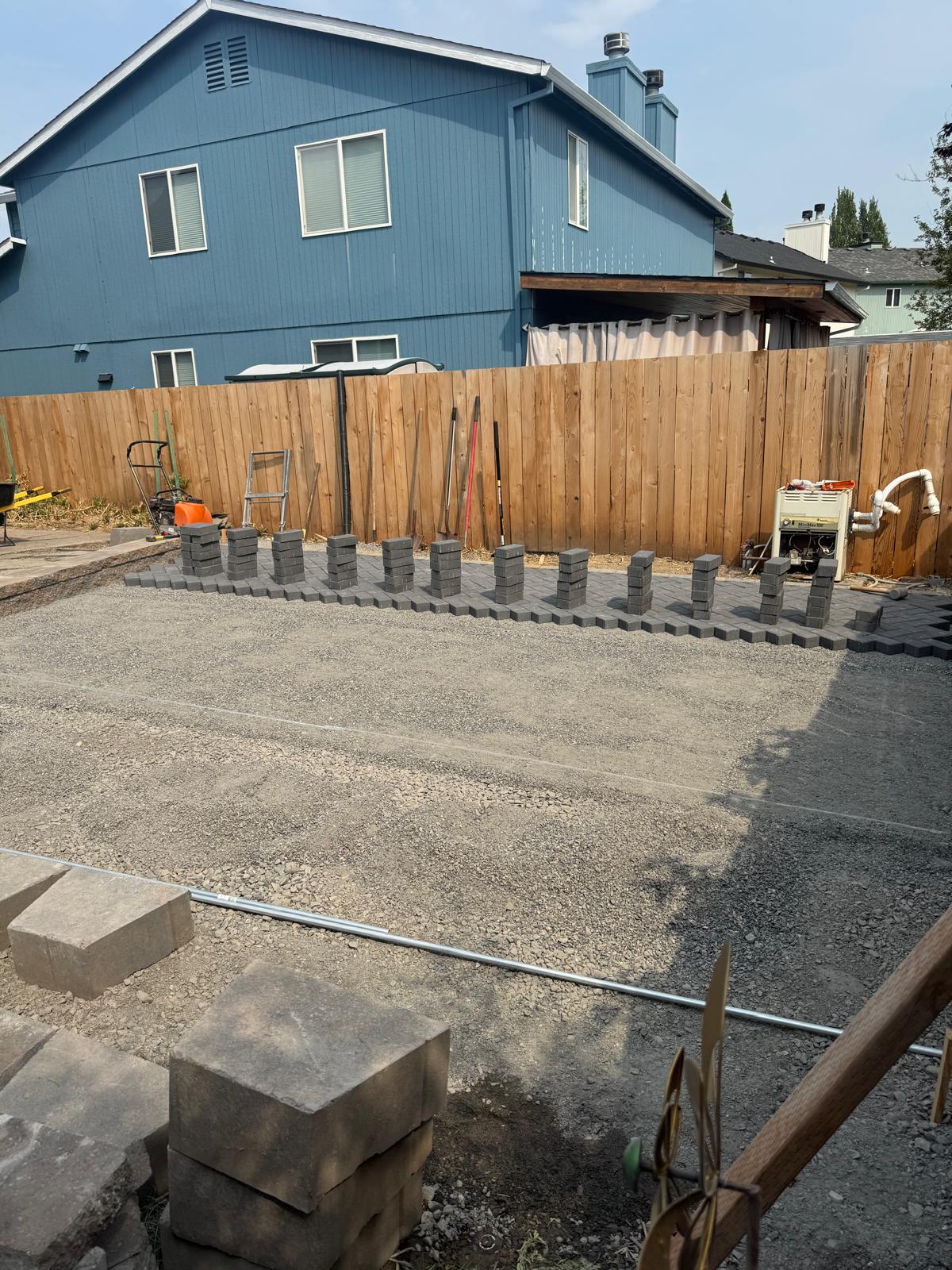 Gravel base prep for patio completed by Metro Mowing Services and Maintenance LLC