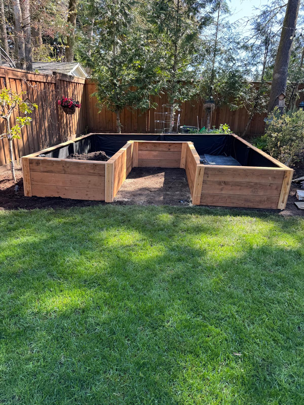 Cedar raised garden bed install completed by Metro Mowing Services and Maintenance LLC