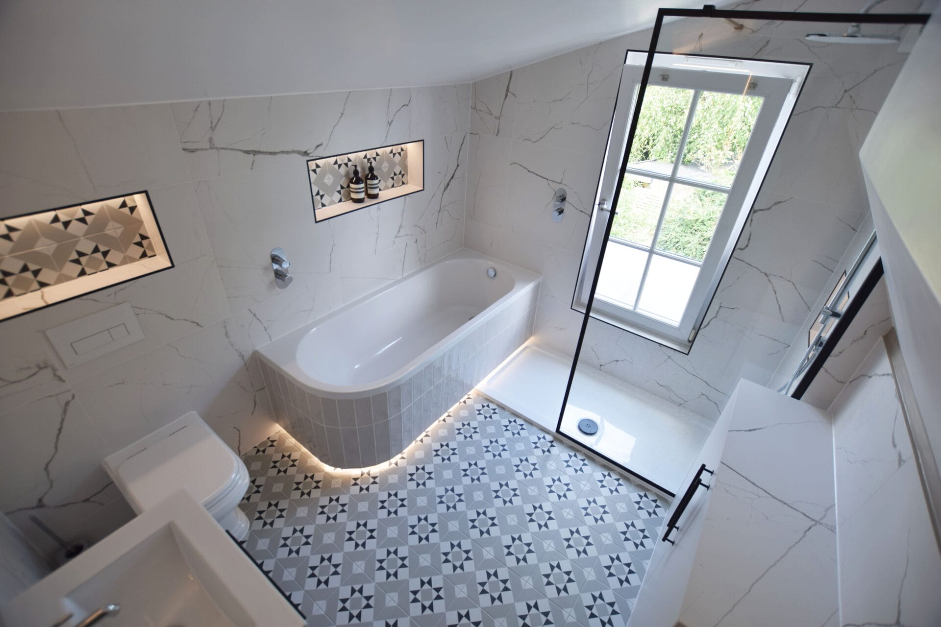 Integrated bathroom storage and lighting