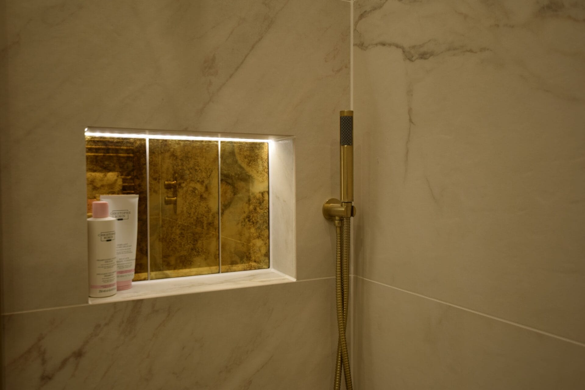 Illuminated recessed shower niche
