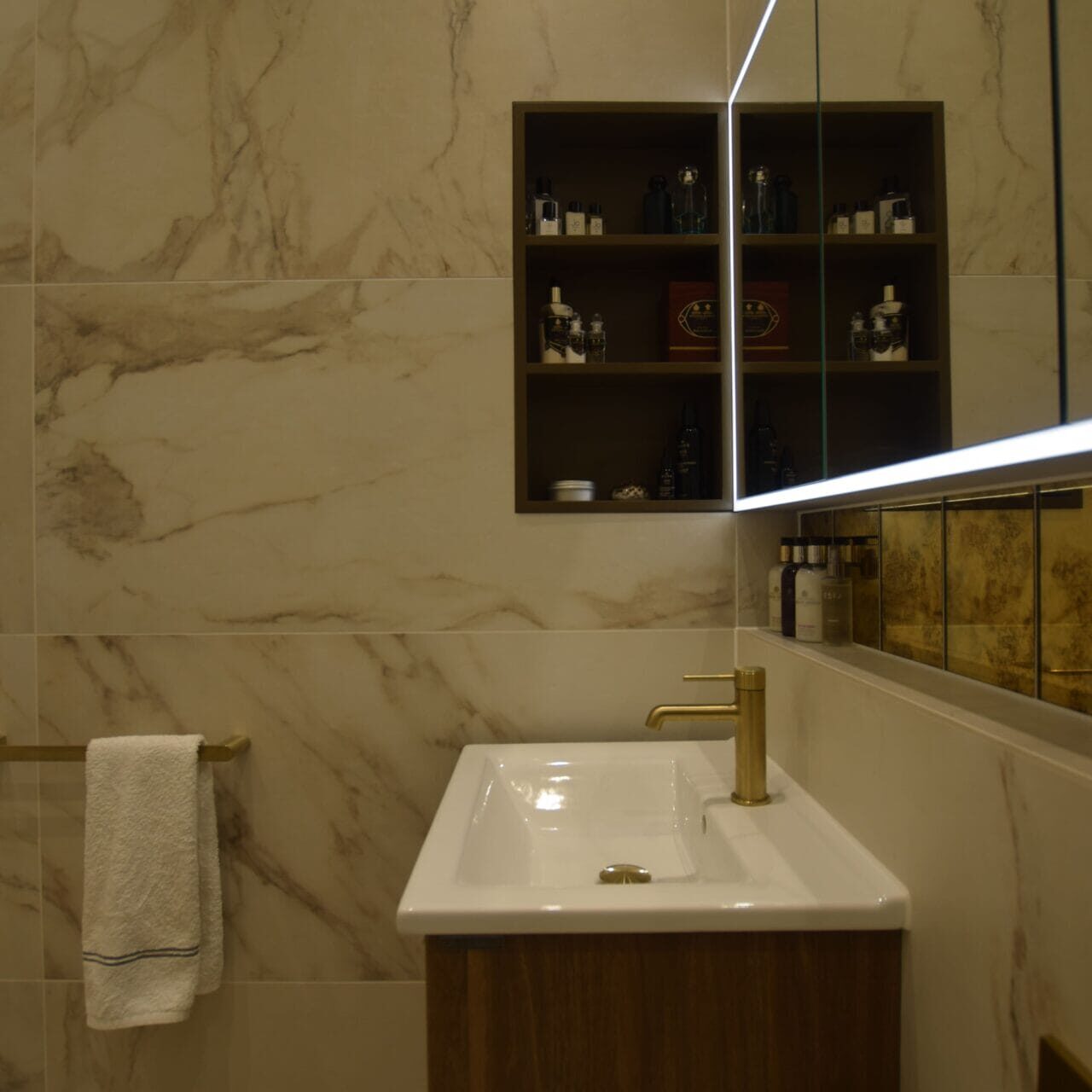 Bespoke recessed storage beside vanity