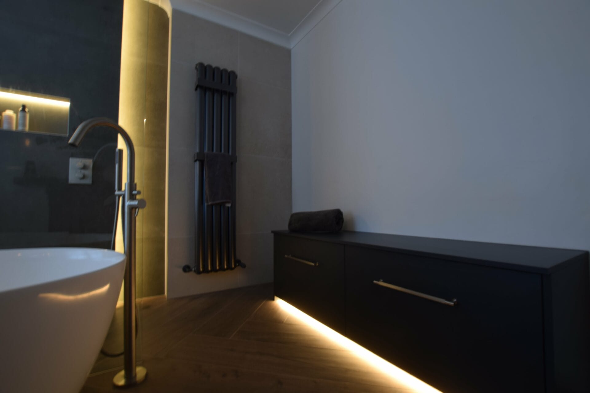 Concealed wet room lighting and storage
