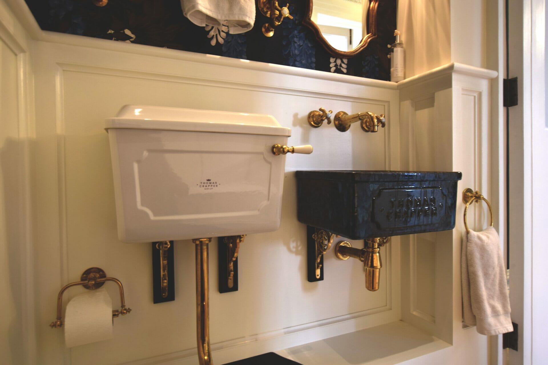 Thomas Crapper basin and exposed cistern with brass fittings