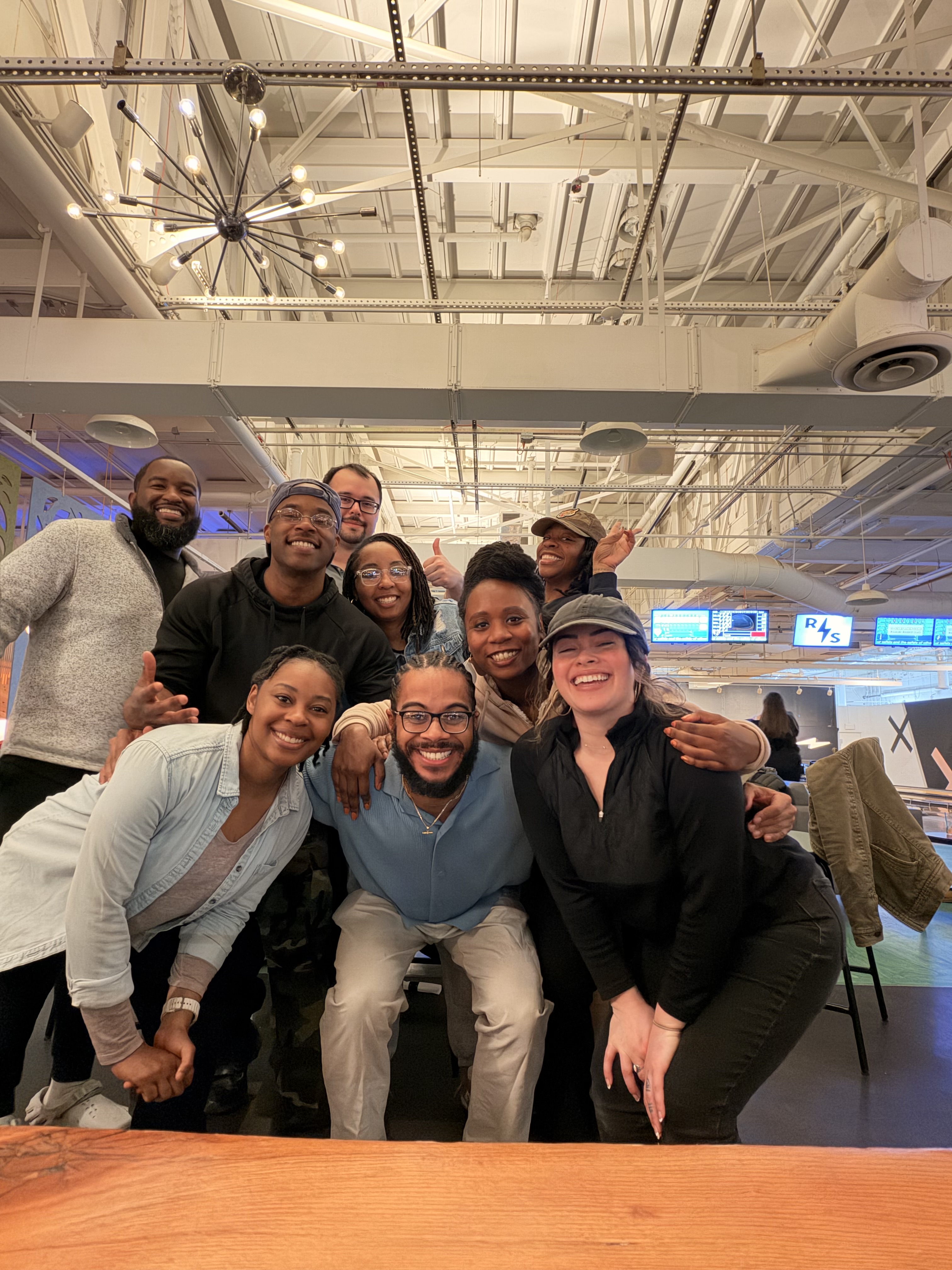 1% Run Club members gathered together at a community meetup in Rochester