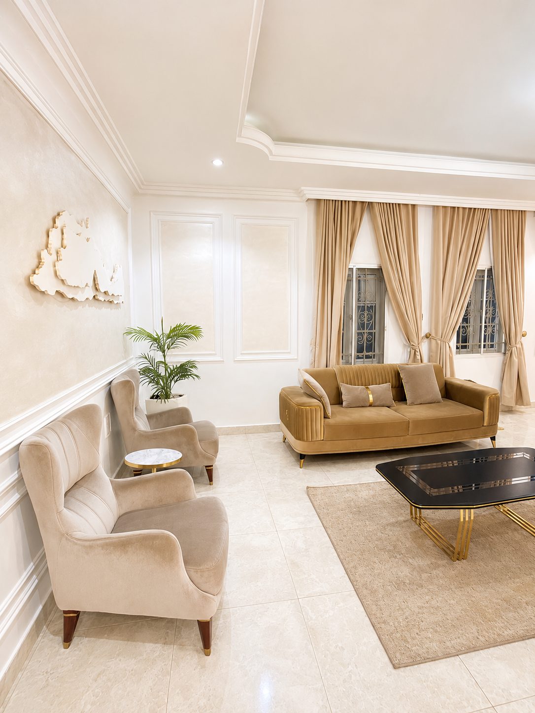 The Nathivian lounge with deep seating, ambient lighting and a wall-mounted screen