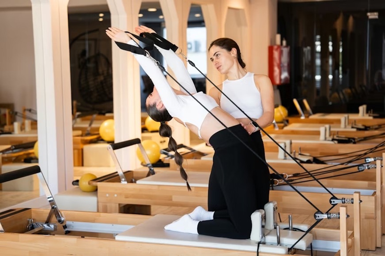 Two women on black and white testing a product