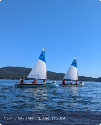 Youth participating in HURTS sail training program on the water, August 2024