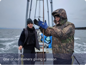 Trainer teaching sailing skills during Horizons Unbound recovery program