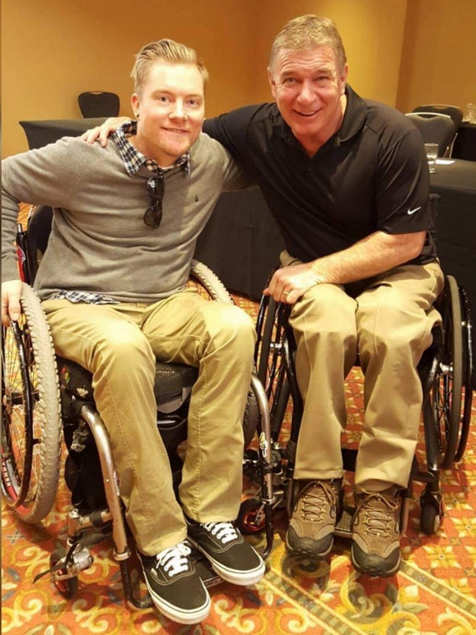 Kevin Brooks connecting with another speaker and advocate