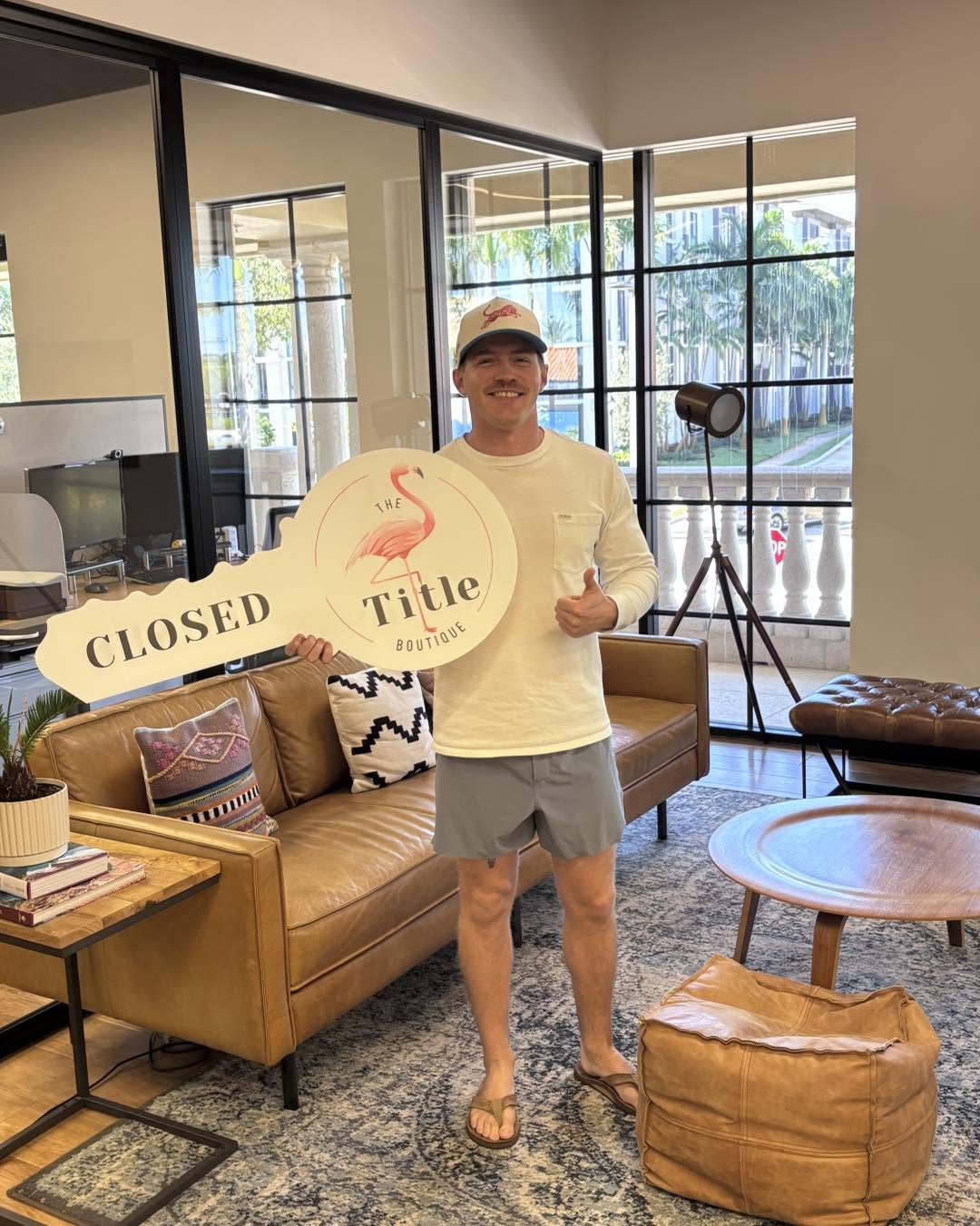 Clients holding their Title Boutique closing key
