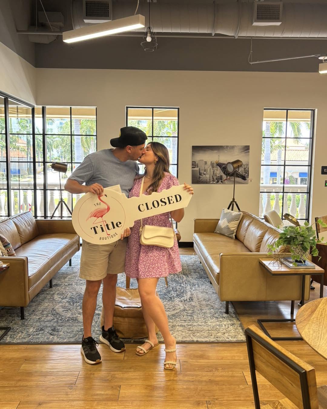 Clients holding their Title Boutique closing key