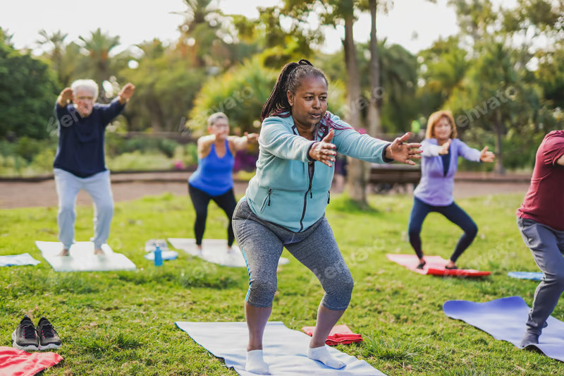 A group moving through yoga together