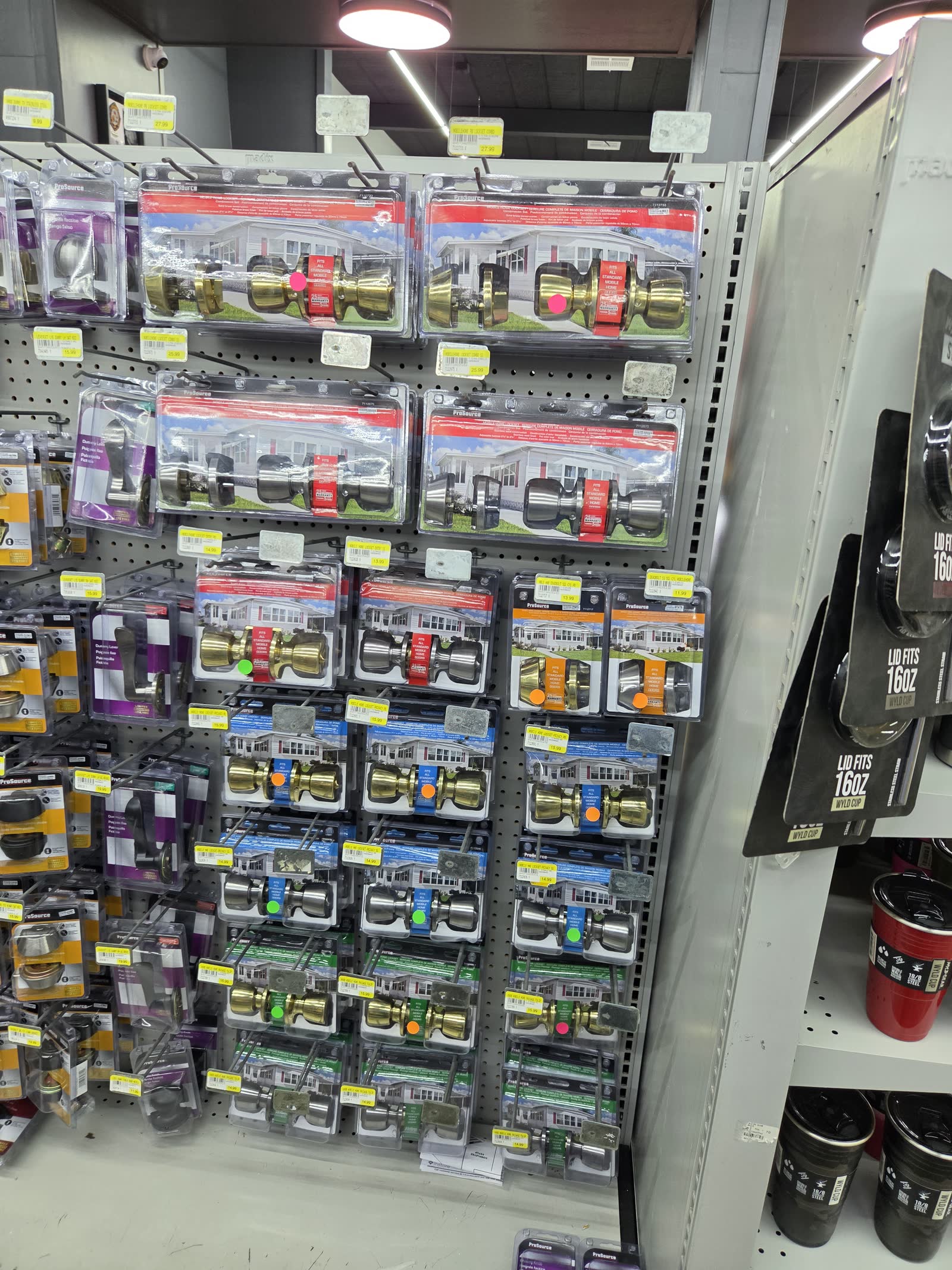 Master Lock padlocks and shaped key blank display at the Cardinal Hardware key cutting counter