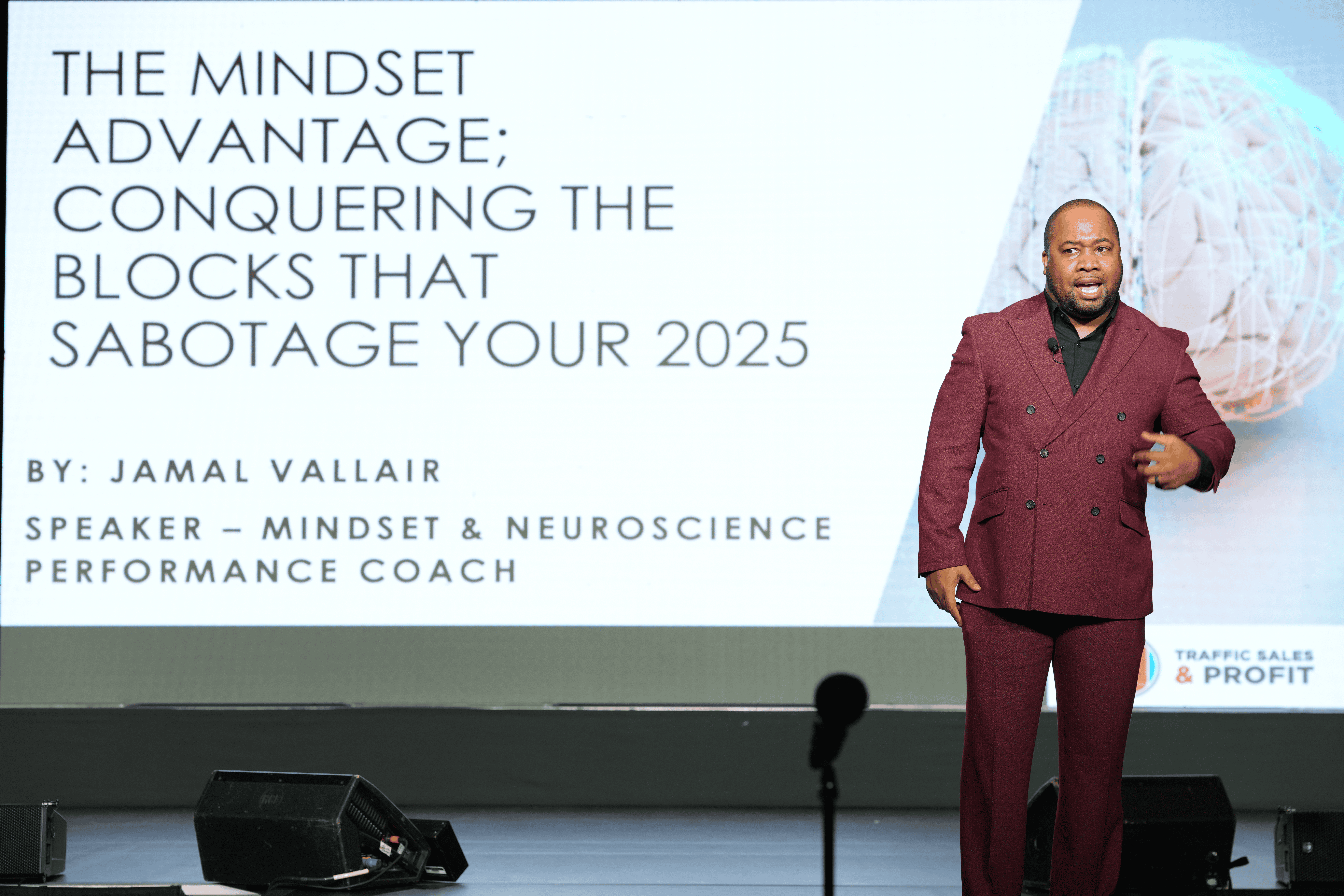 Jamal Vallair delivering an engaging keynote at a live event