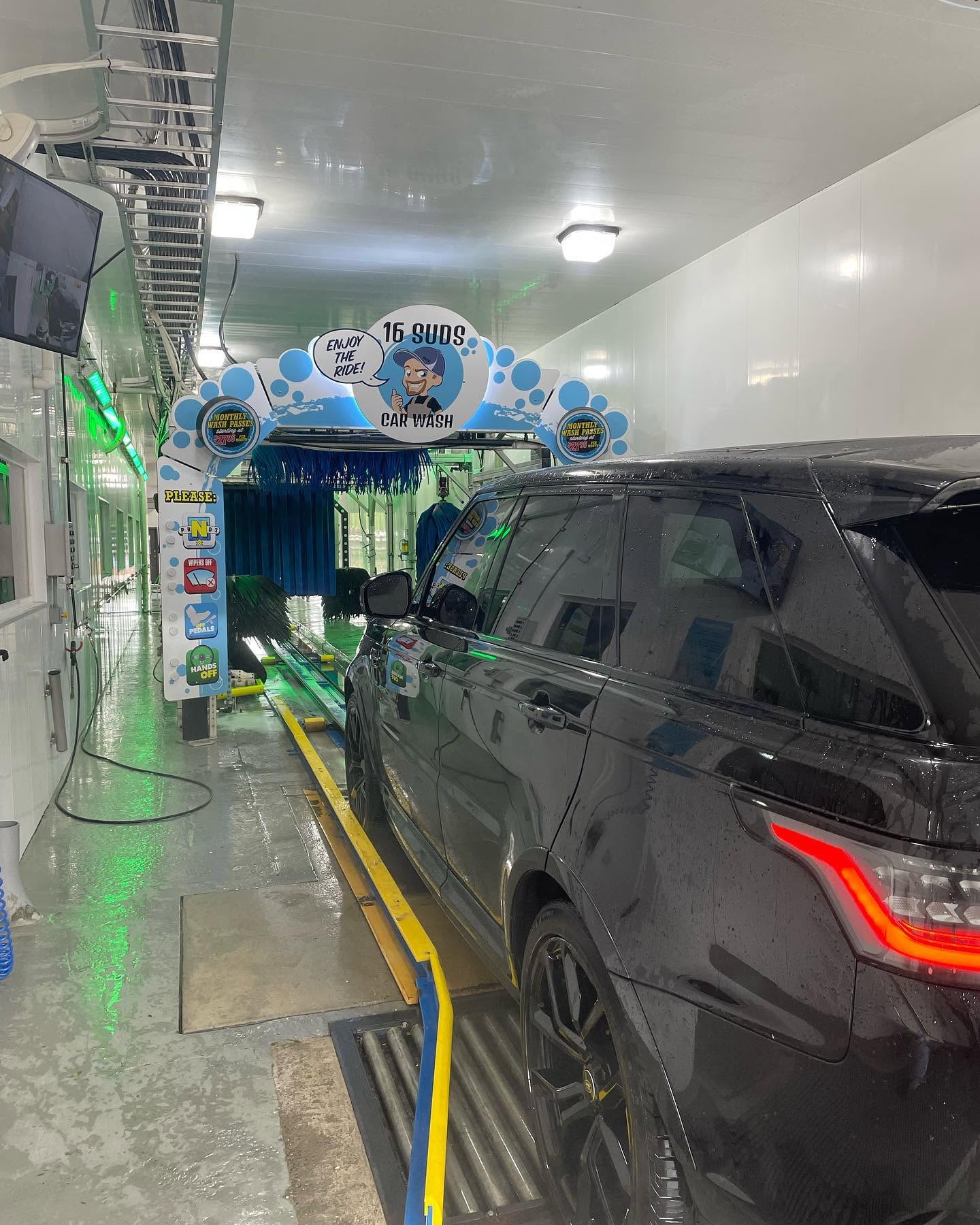 Car going through the 16 Suds tunnel wash