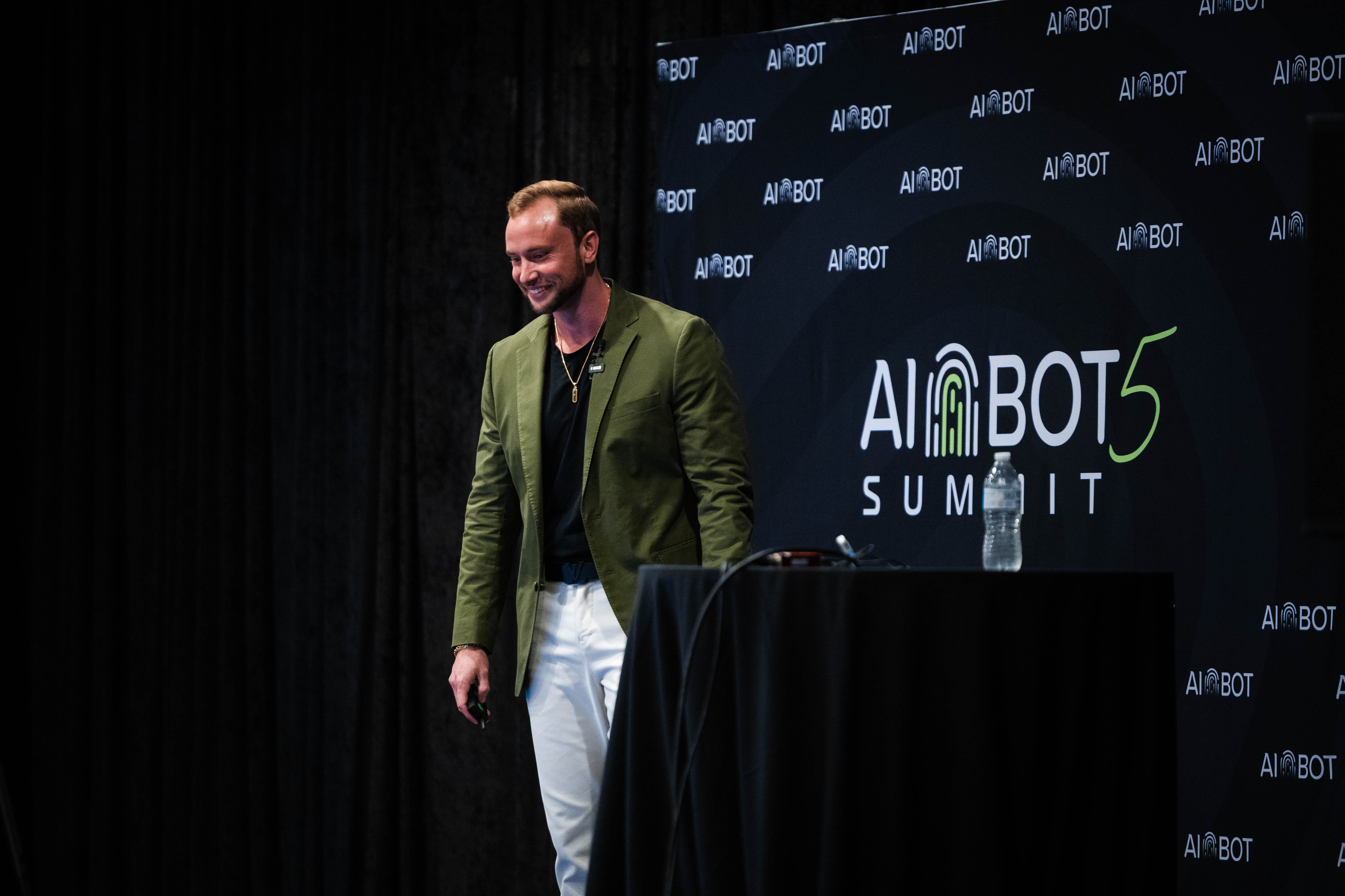 Jake Randolph and Tony Cruz speaking at AI Bot Summit 2026