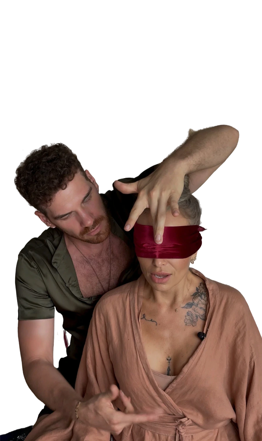 A blindfolded client receiving a Vādma neck release